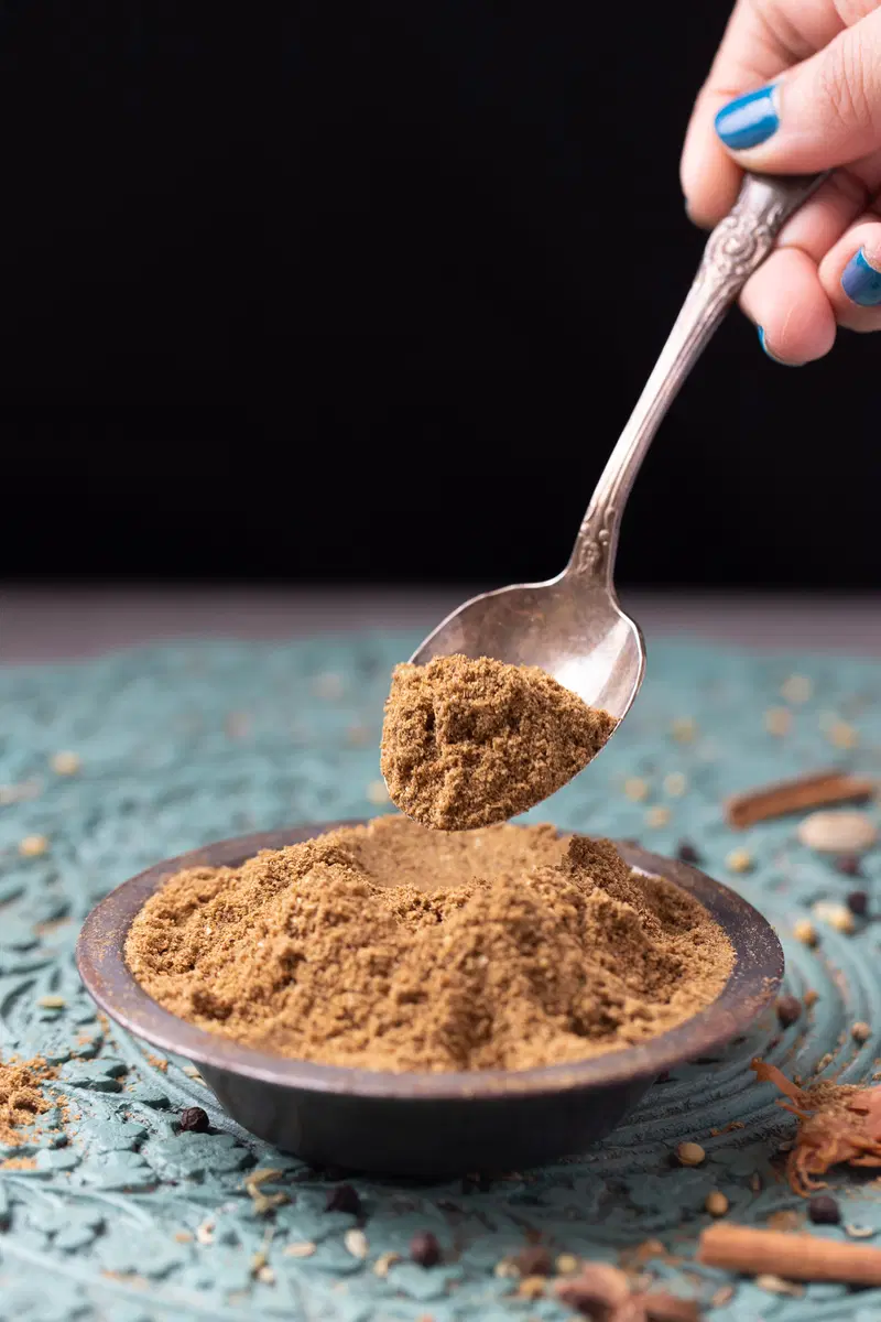 Spooning out some garam masala