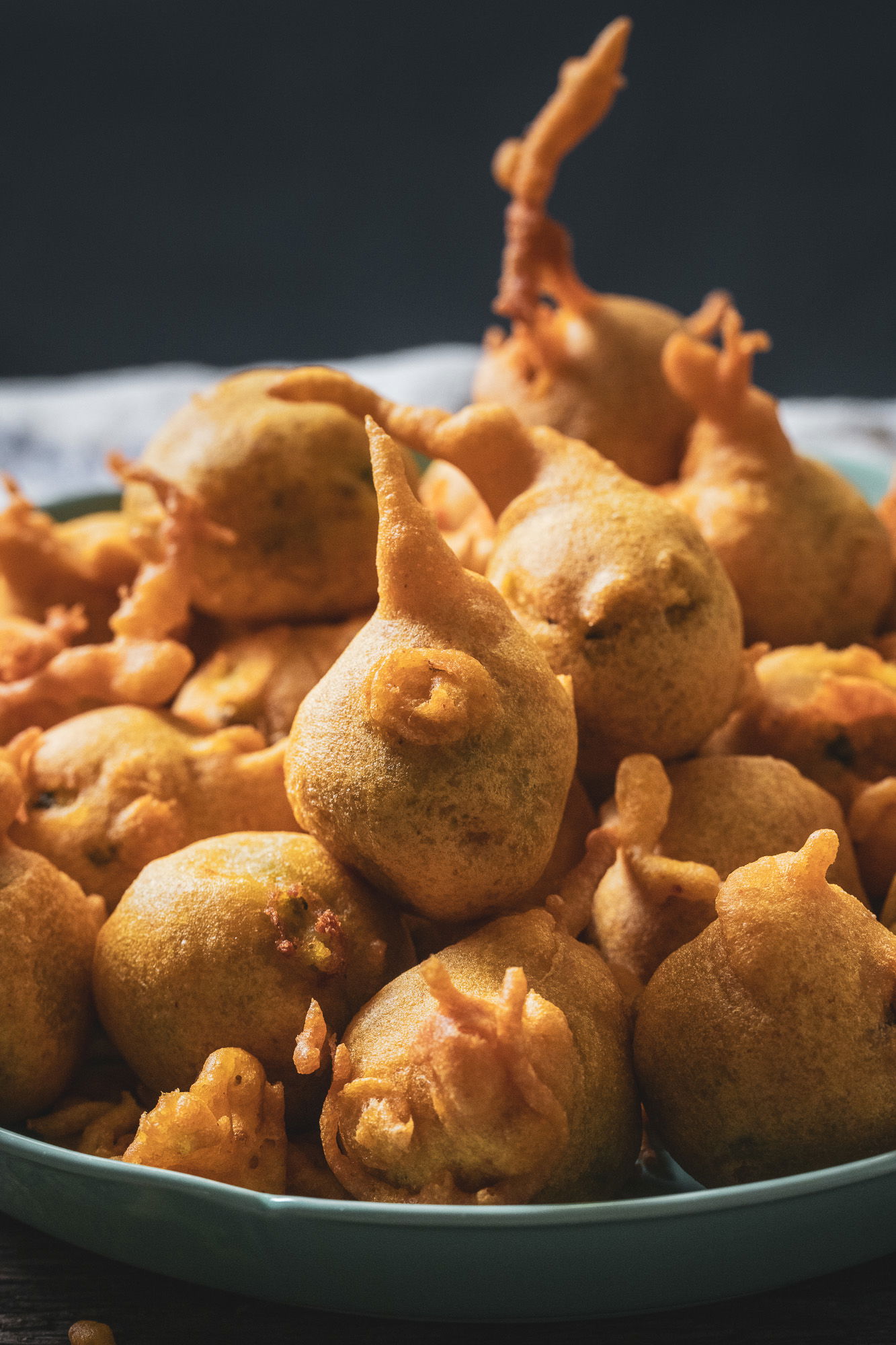 A pile of batata vada.