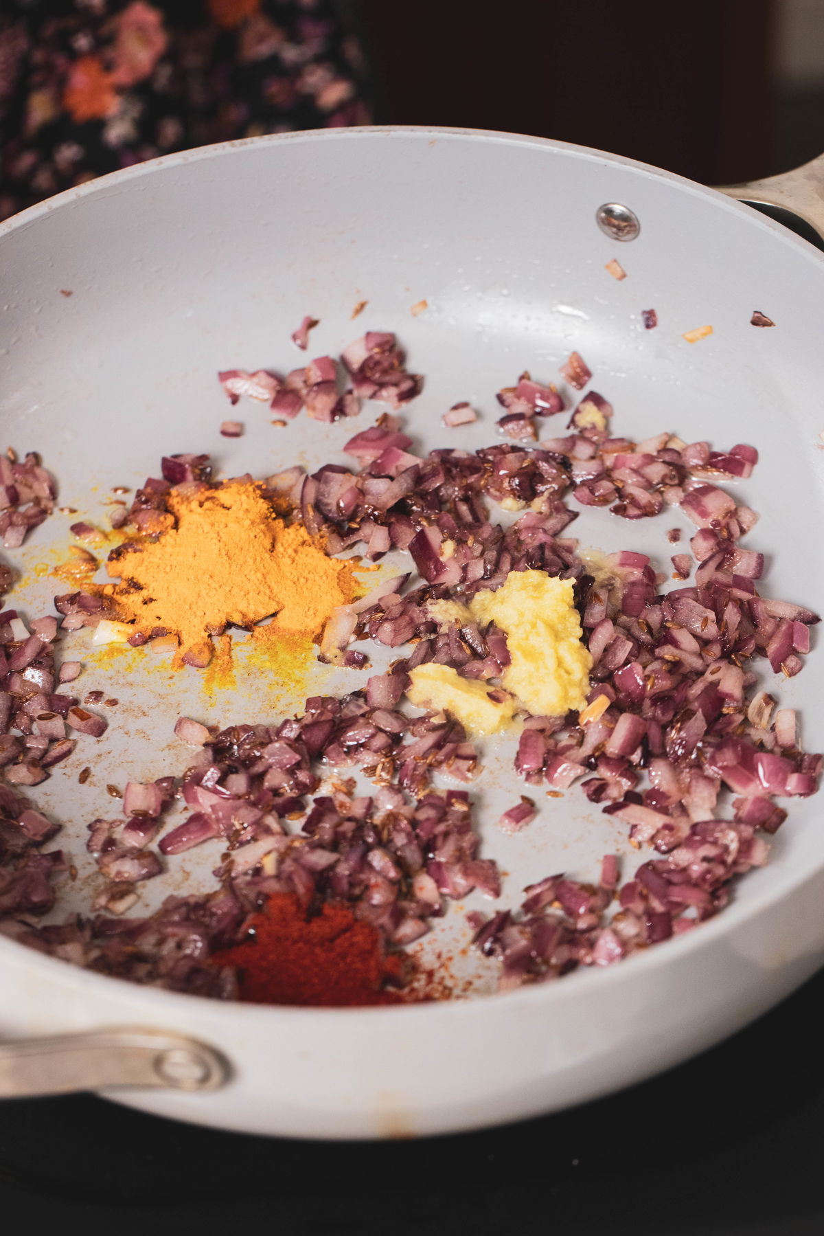 Add turmeric, ginger, and chili powder.