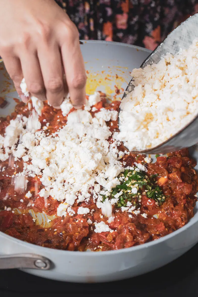 Add the crumbled or grated paneer.