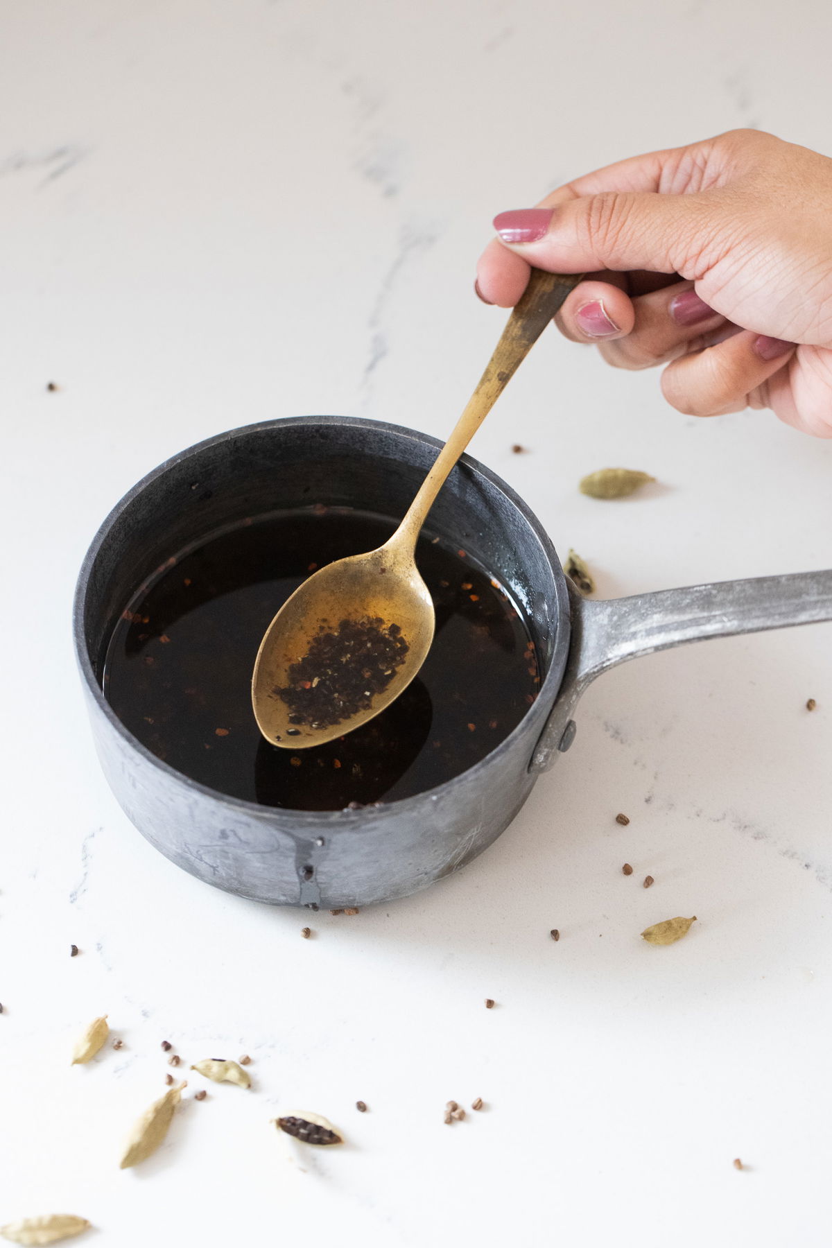 Boiling cardamom pods