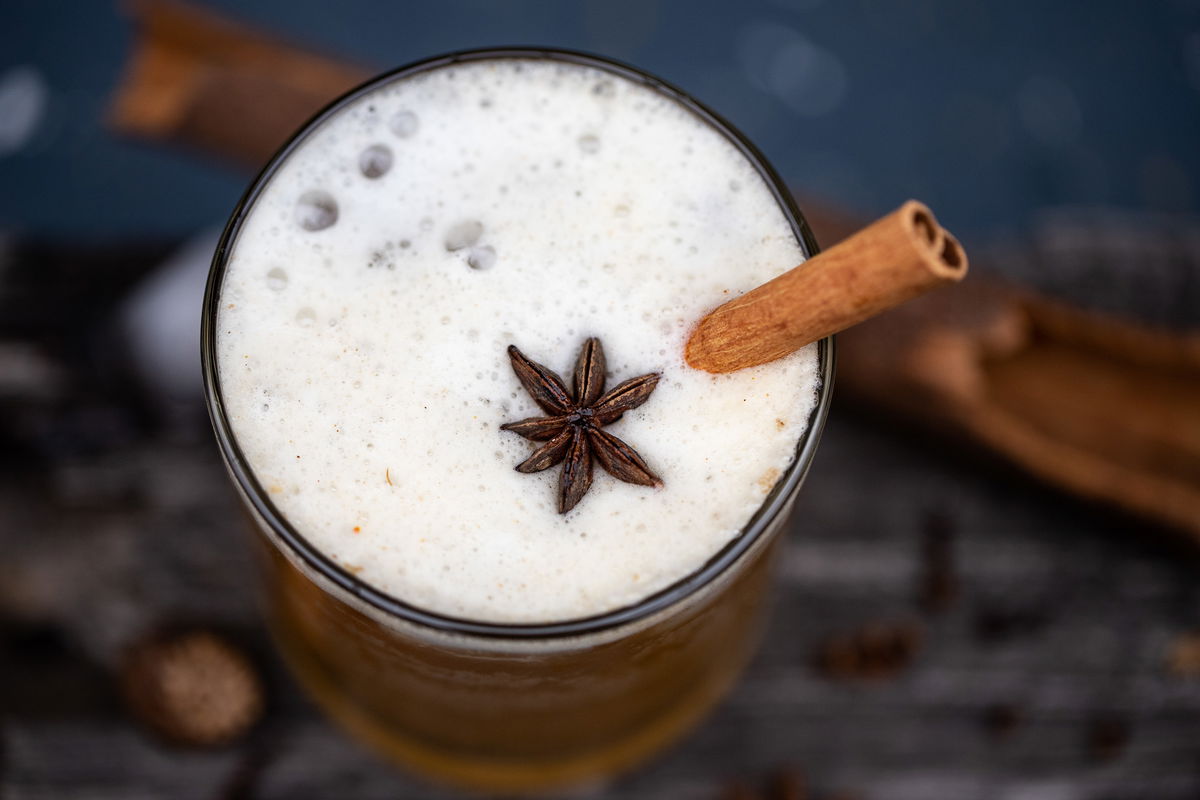 Top view of a glass of Chai Bourbon Fizz