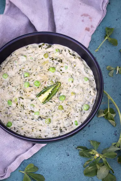 Bowl of methi matar malai