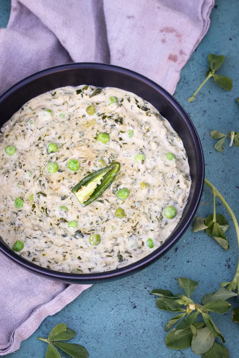 Bowl of methi matar malai
