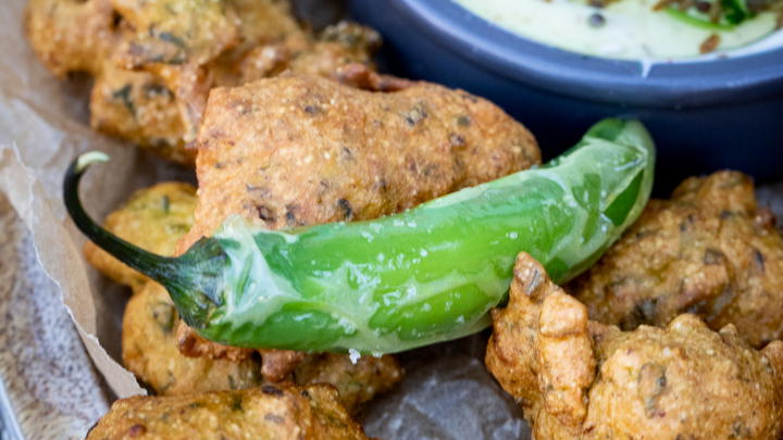 Methi na gota with spiced yogurt dip