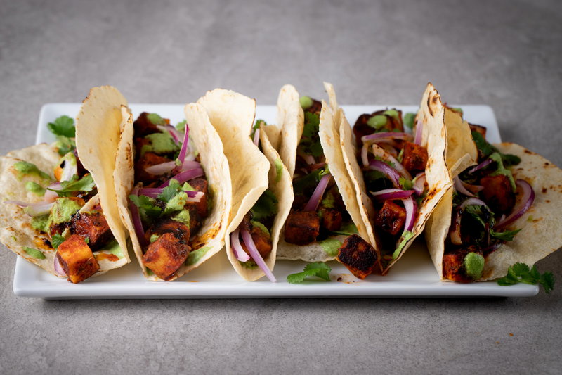 Row of paneer tacos