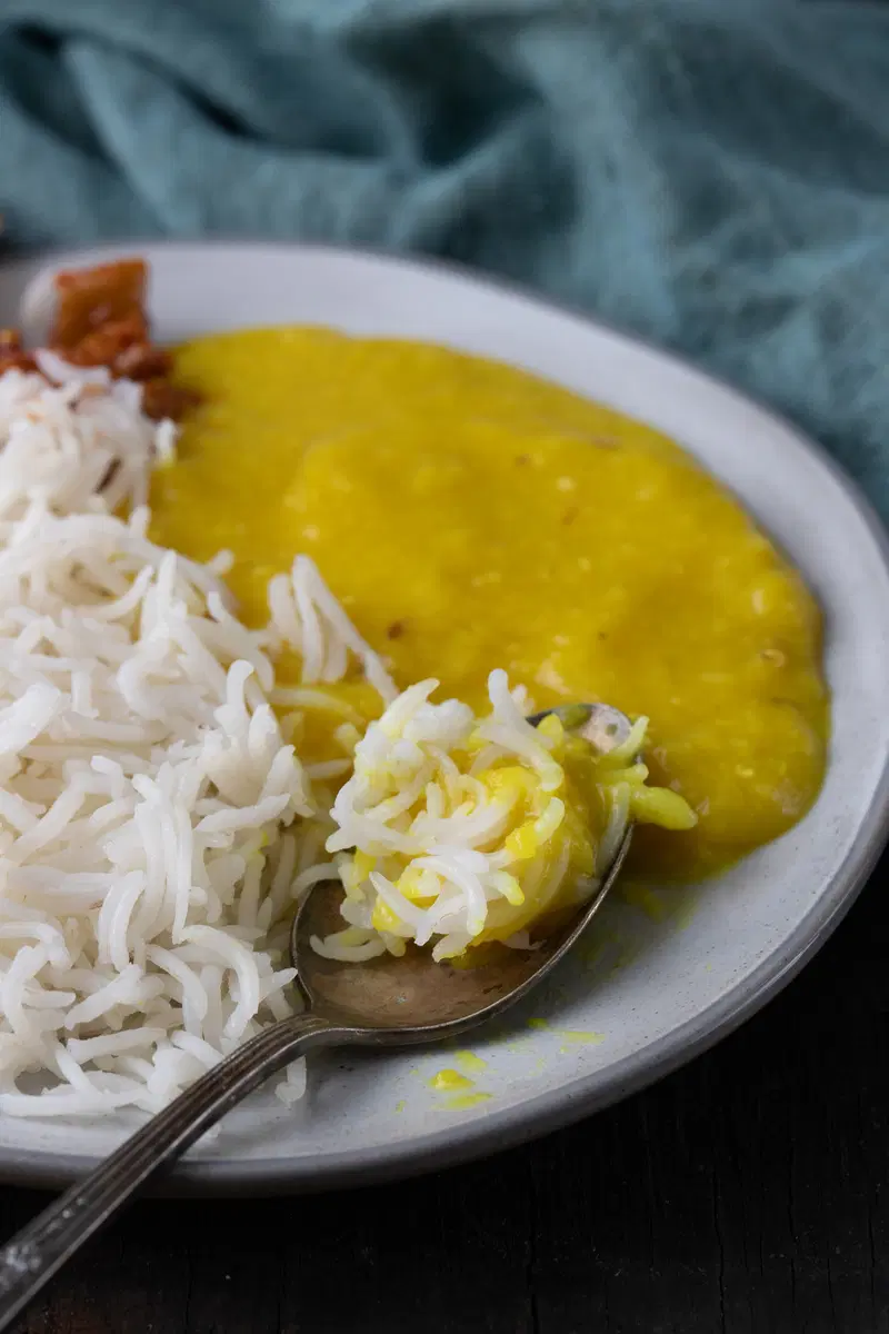 A plate of dal chawal, rice and dal.