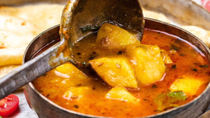 Serving batata nu shaak