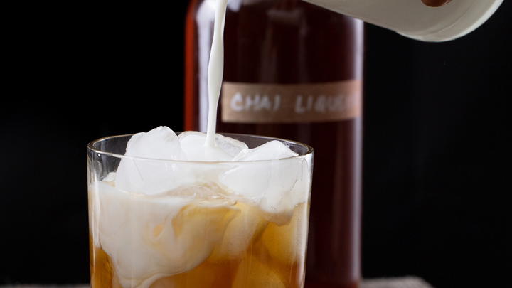 Pouring the milk into the chai white russian