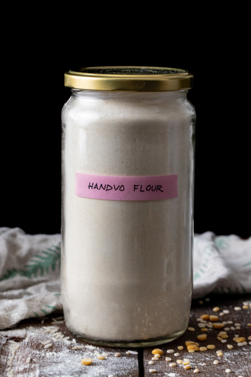 Handvo flour, stored in a jar.