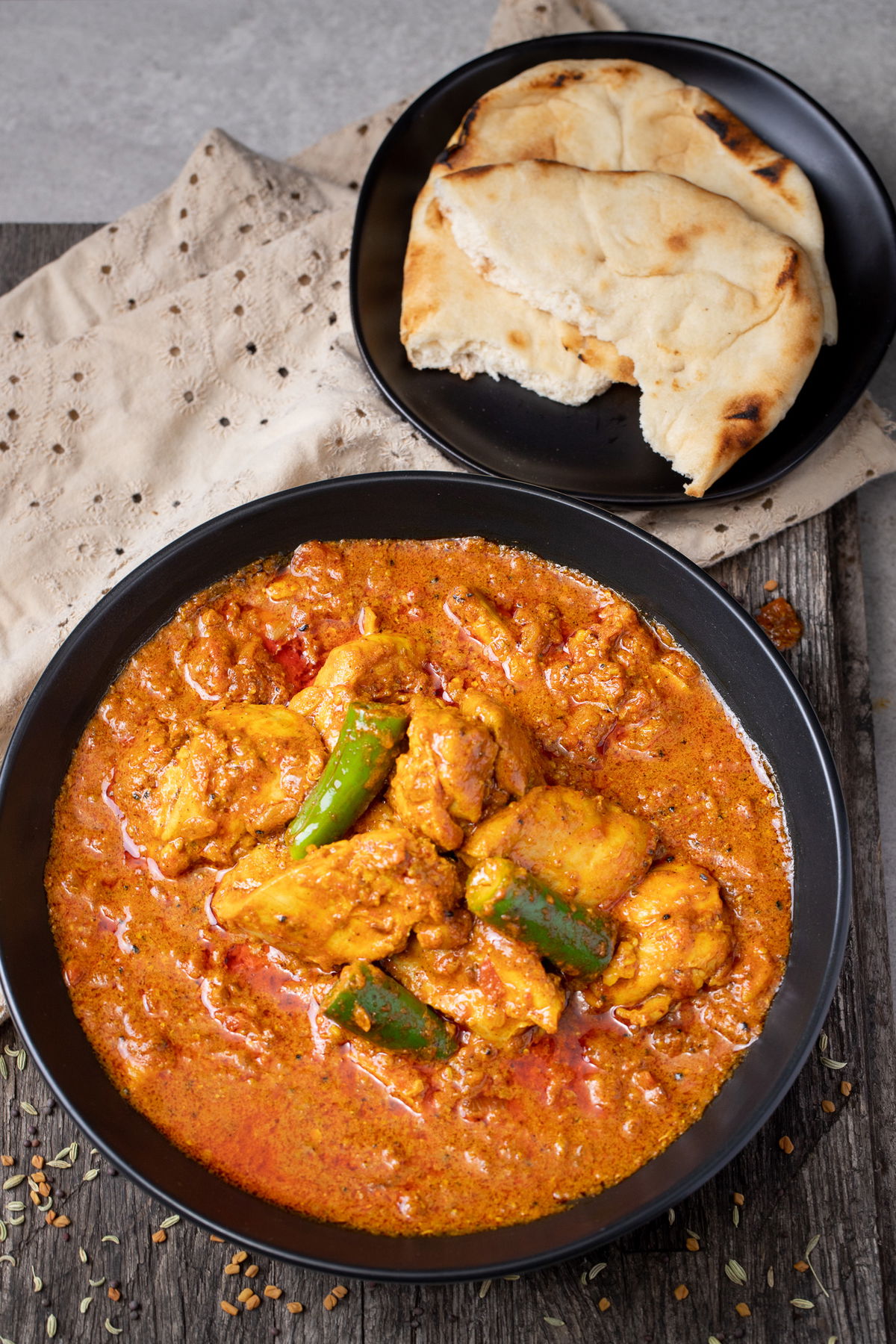Achari chicken served with roti