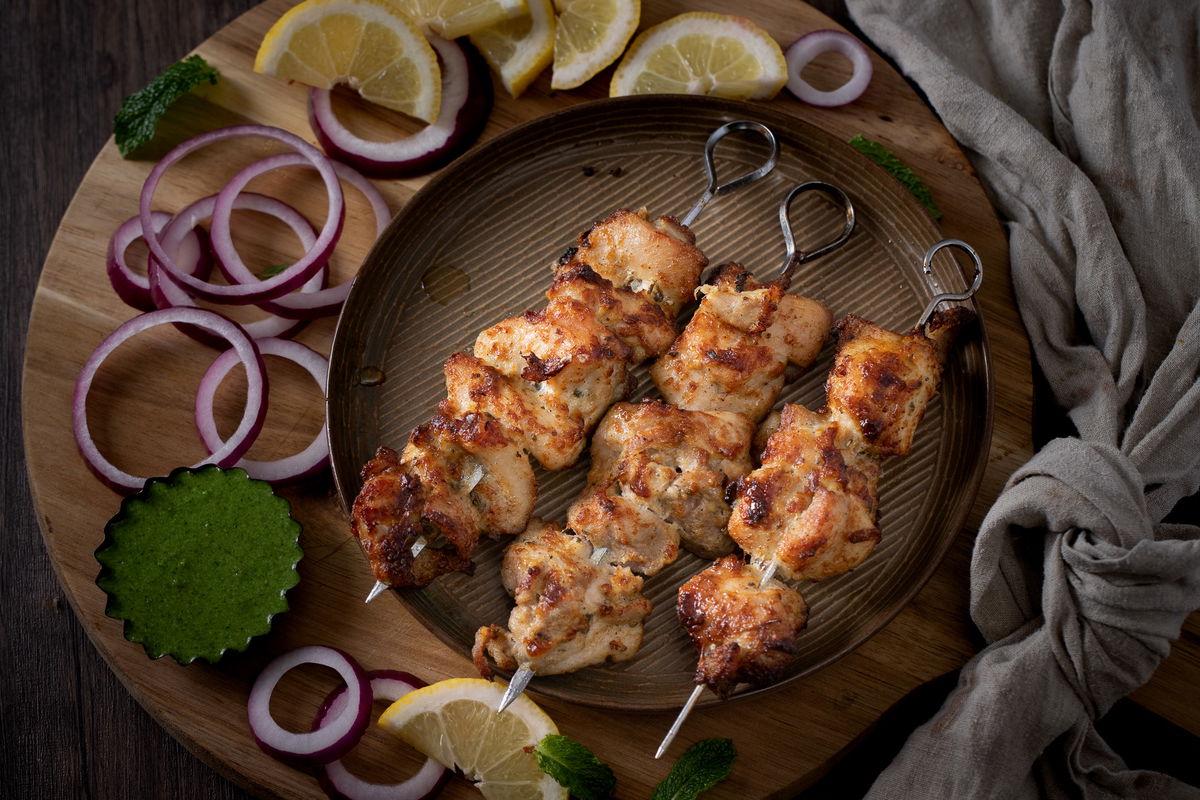 Plate with three malai chicken kababs