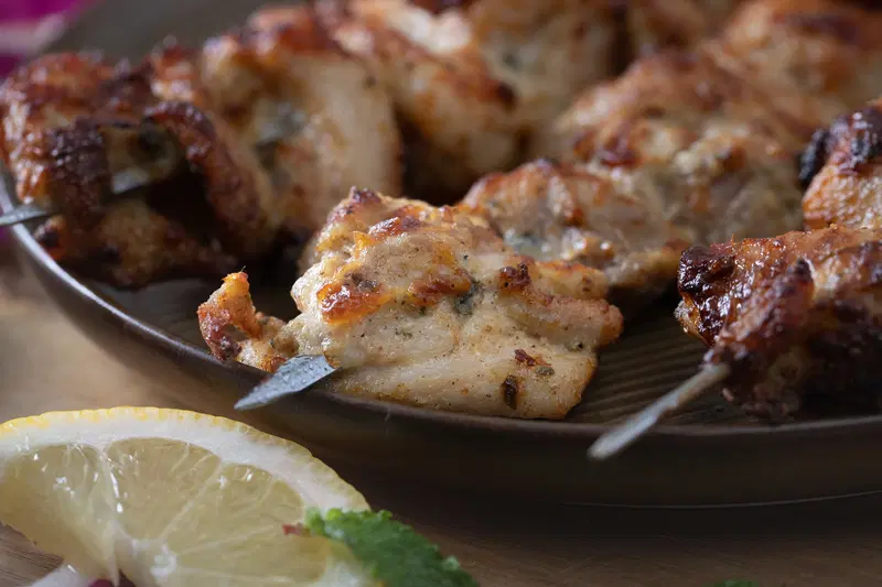 Close up of a malai chicken kabab