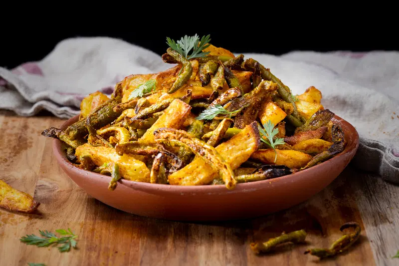 Bowl of potato and tindora fry