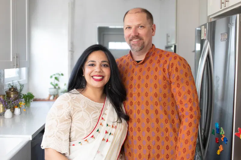 Puja and Steve in the kitchen.