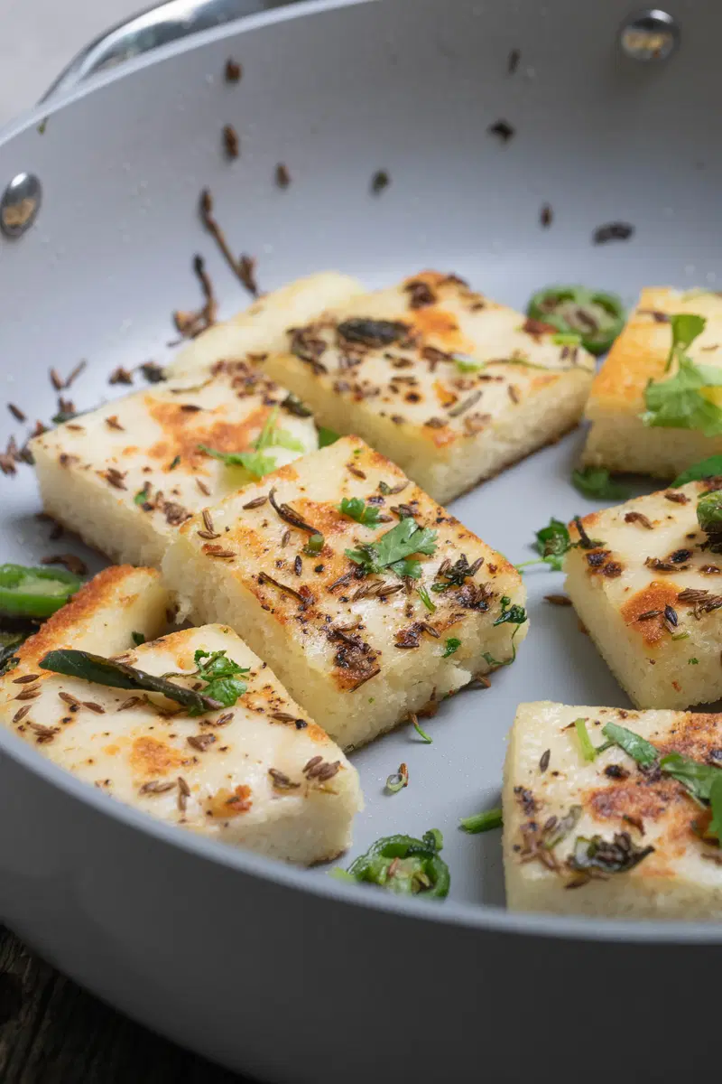Vaghareli Dhokla in the pan