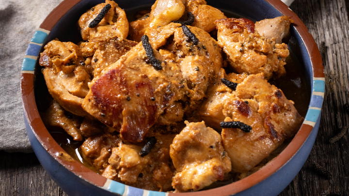 A bowl of long pepper chicken.