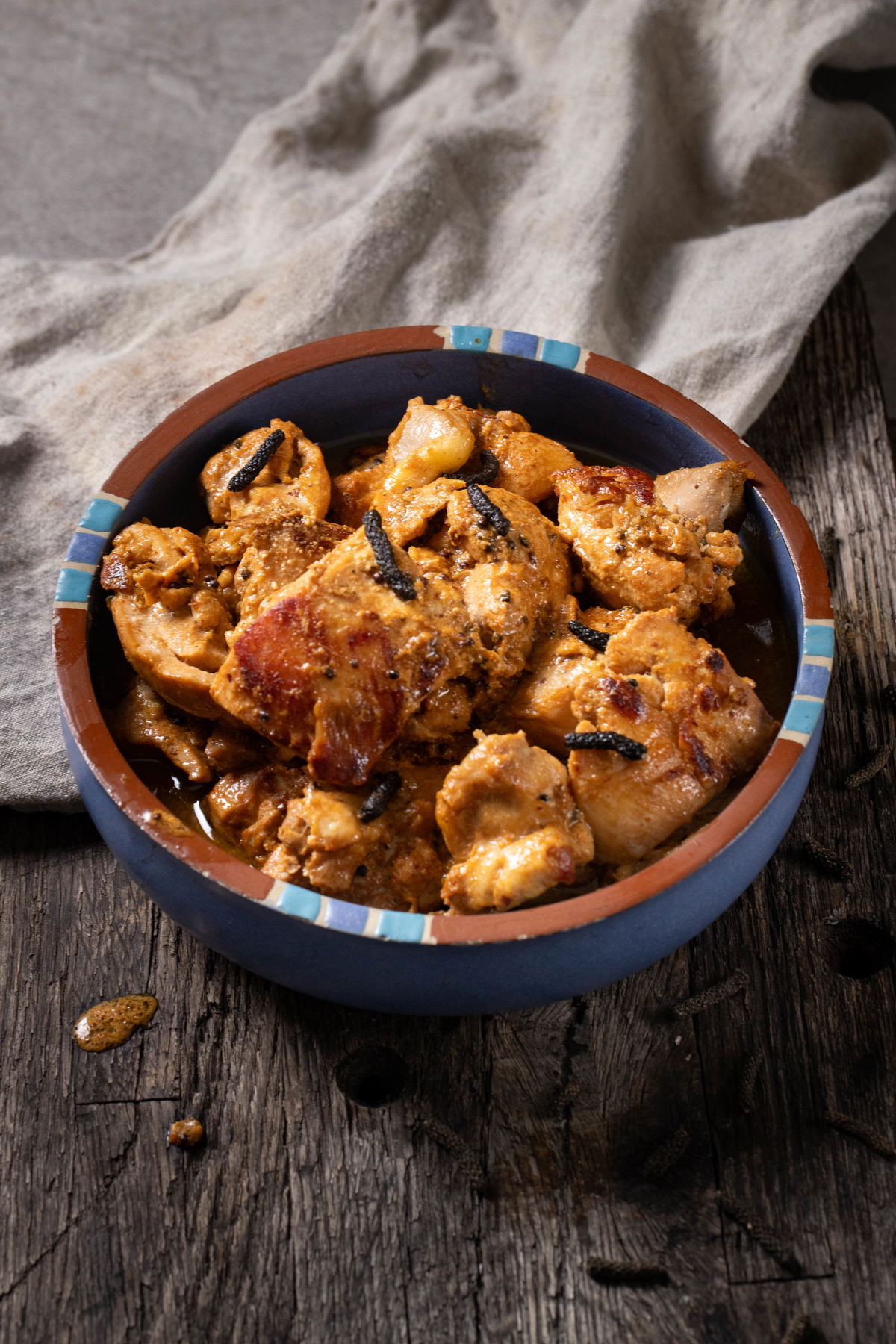 A bowl of long pepper chicken.
