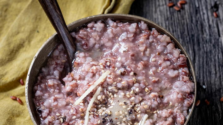 A bowl of yavagu (red rice porridge)