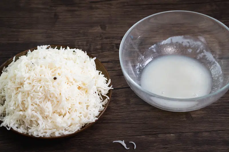 A plate of boiled rice and congee.