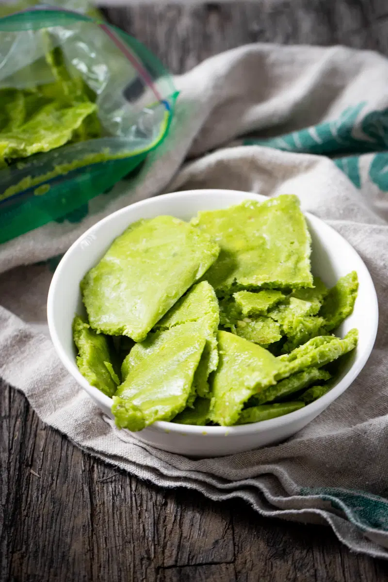 Chunks of green chili paste in a bowl