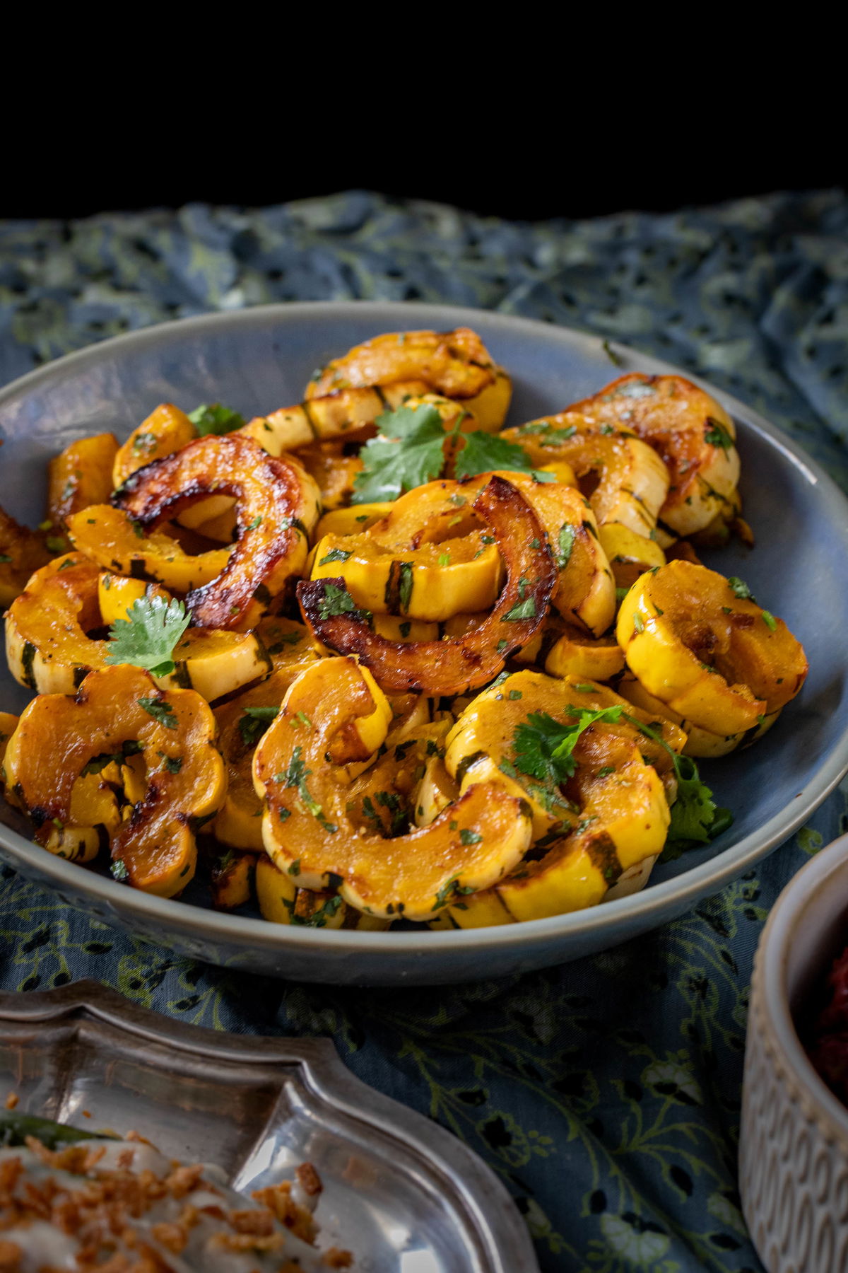 Masala delicata squash in a bowl