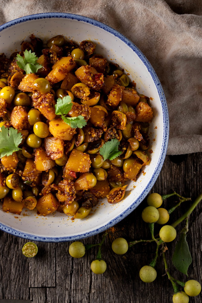 A bowl of turkey berry curry.