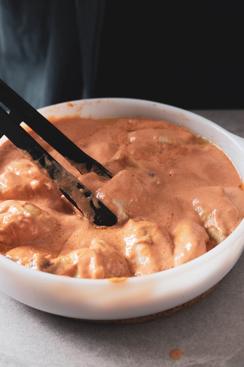Toss the wings in the sauce.