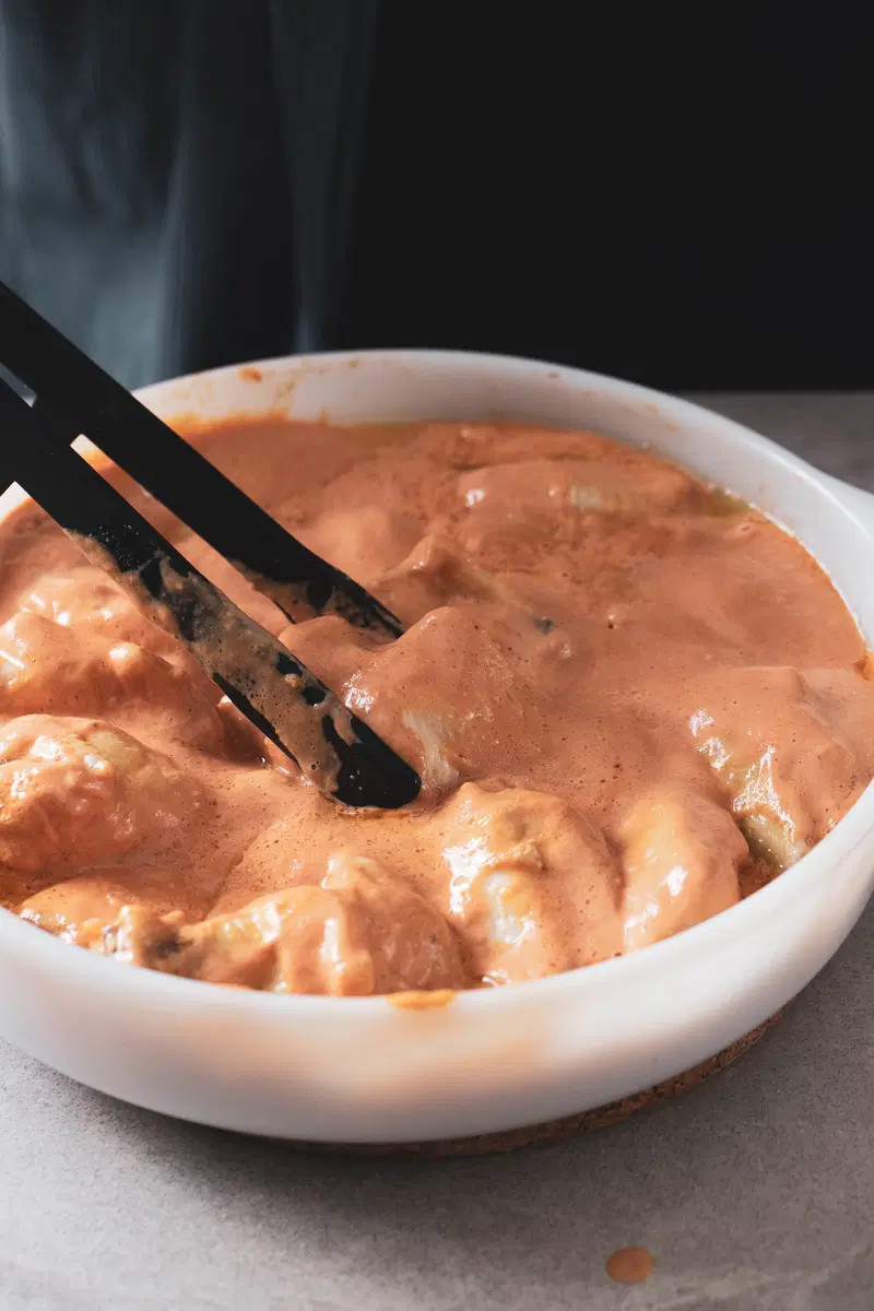 Toss the wings in the sauce.