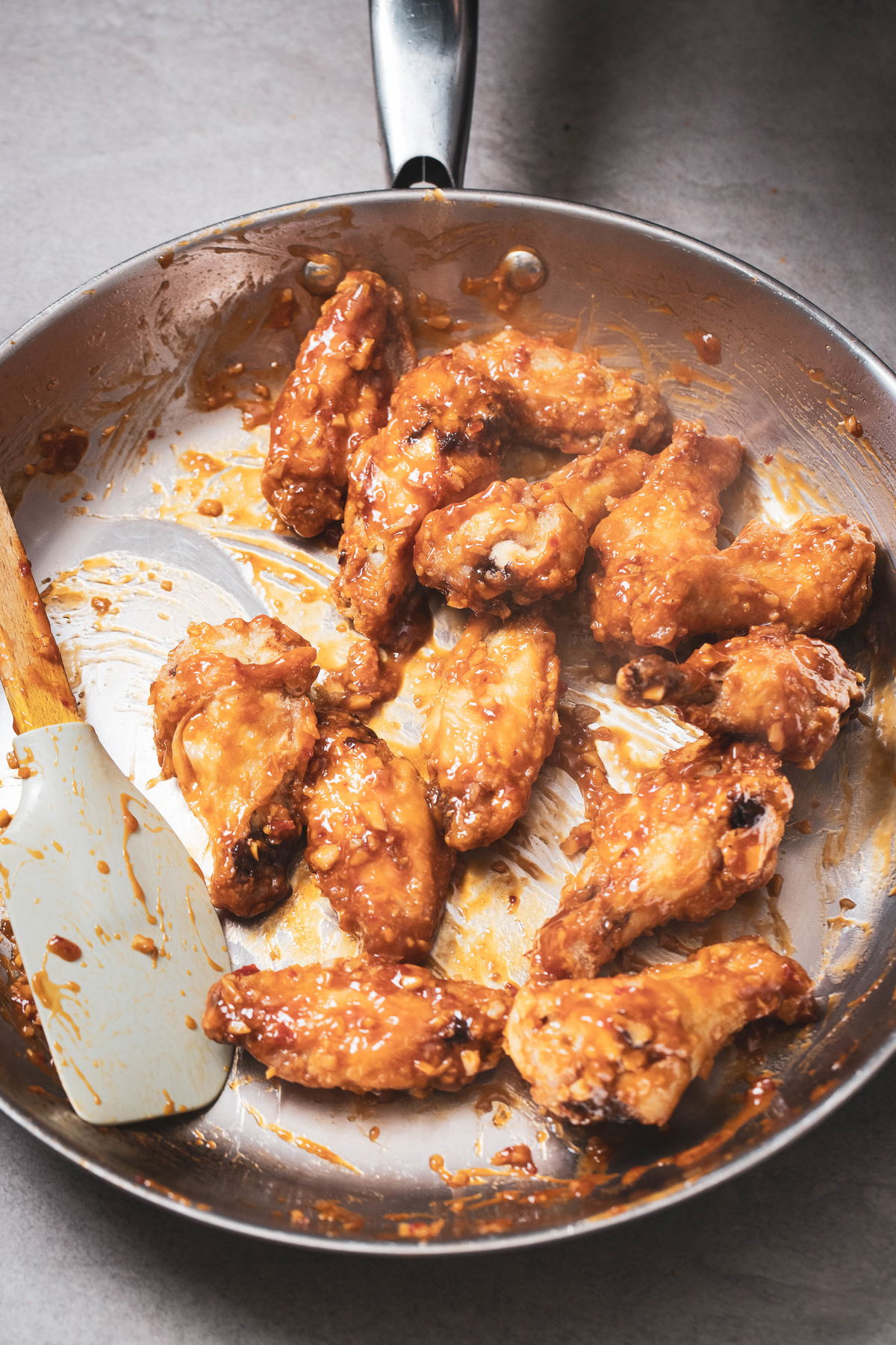 Toss the wings to coat in the sauce.