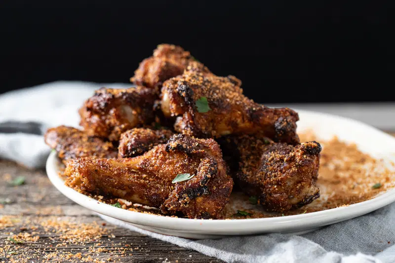 Plate of dry rubbed chicken wings