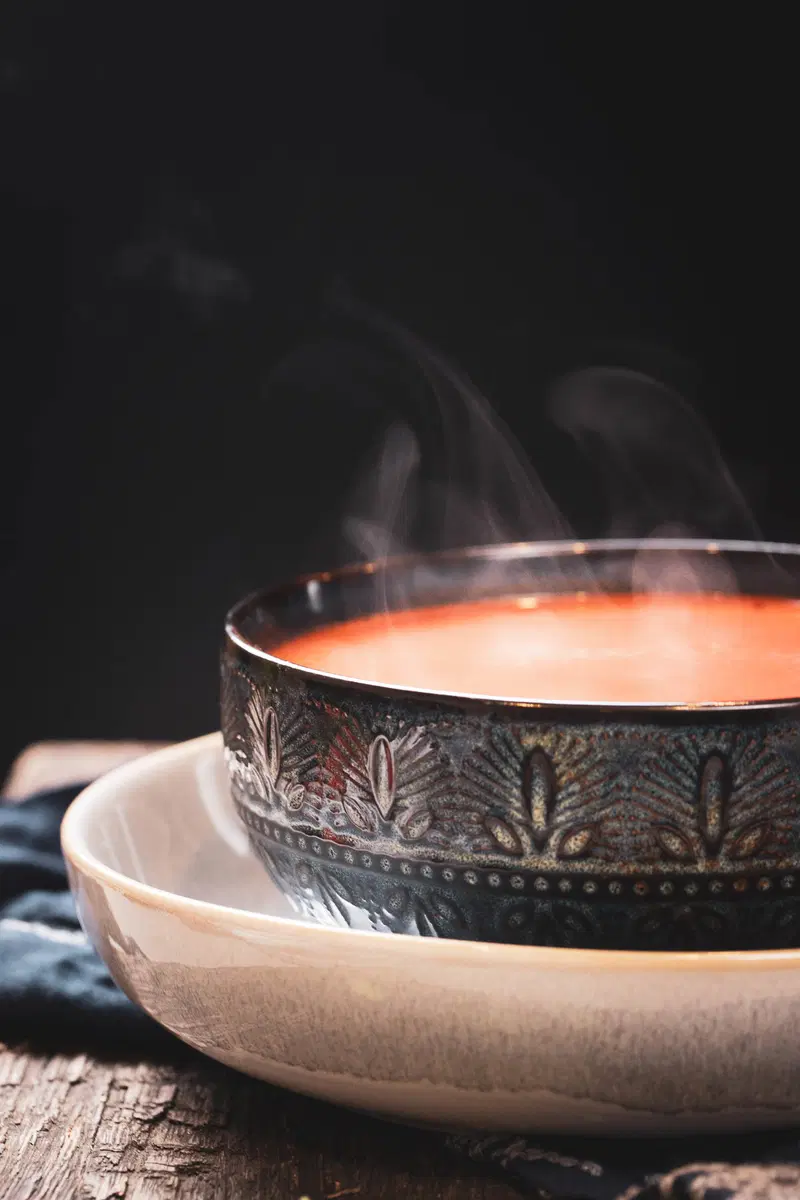 Steaming spicy tomato soup.