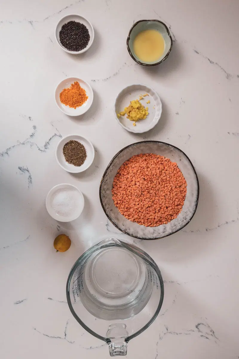 Ingredients: balck pepper, turmeric, ghee, ginger, mustard seeds, masoor dal, water, and fresh lemon juice.