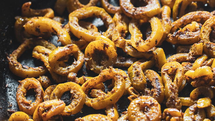 Snake gourd in a cast iron pan.