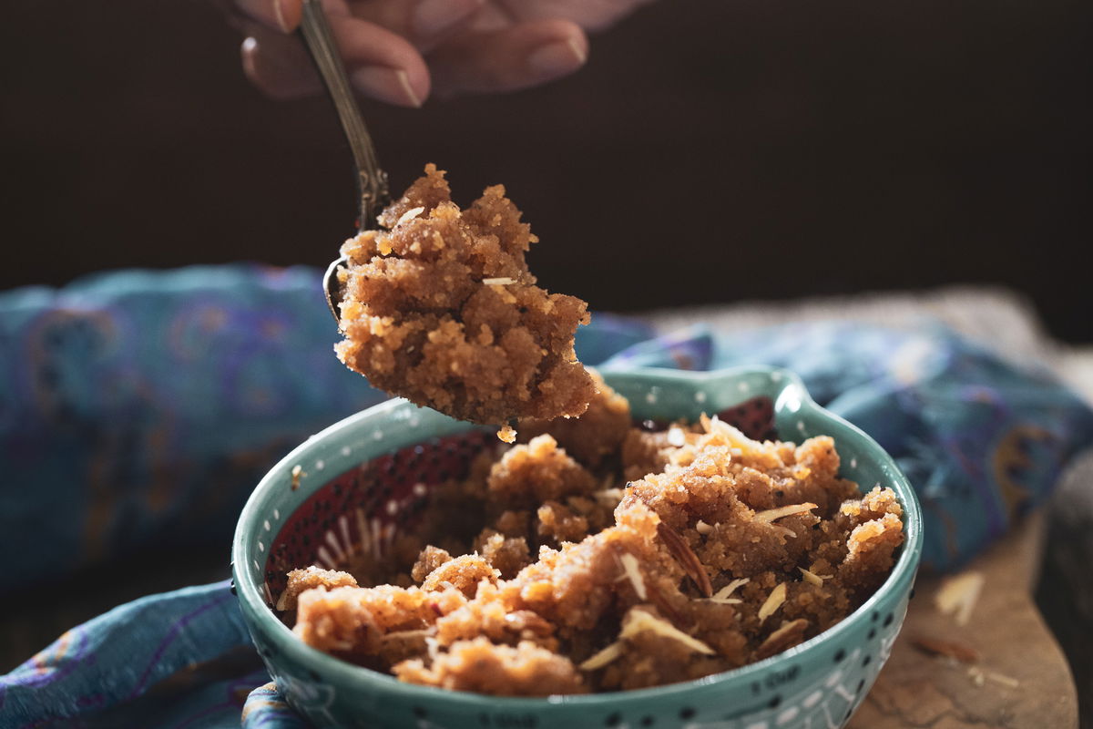 Spooning out some badam halwa