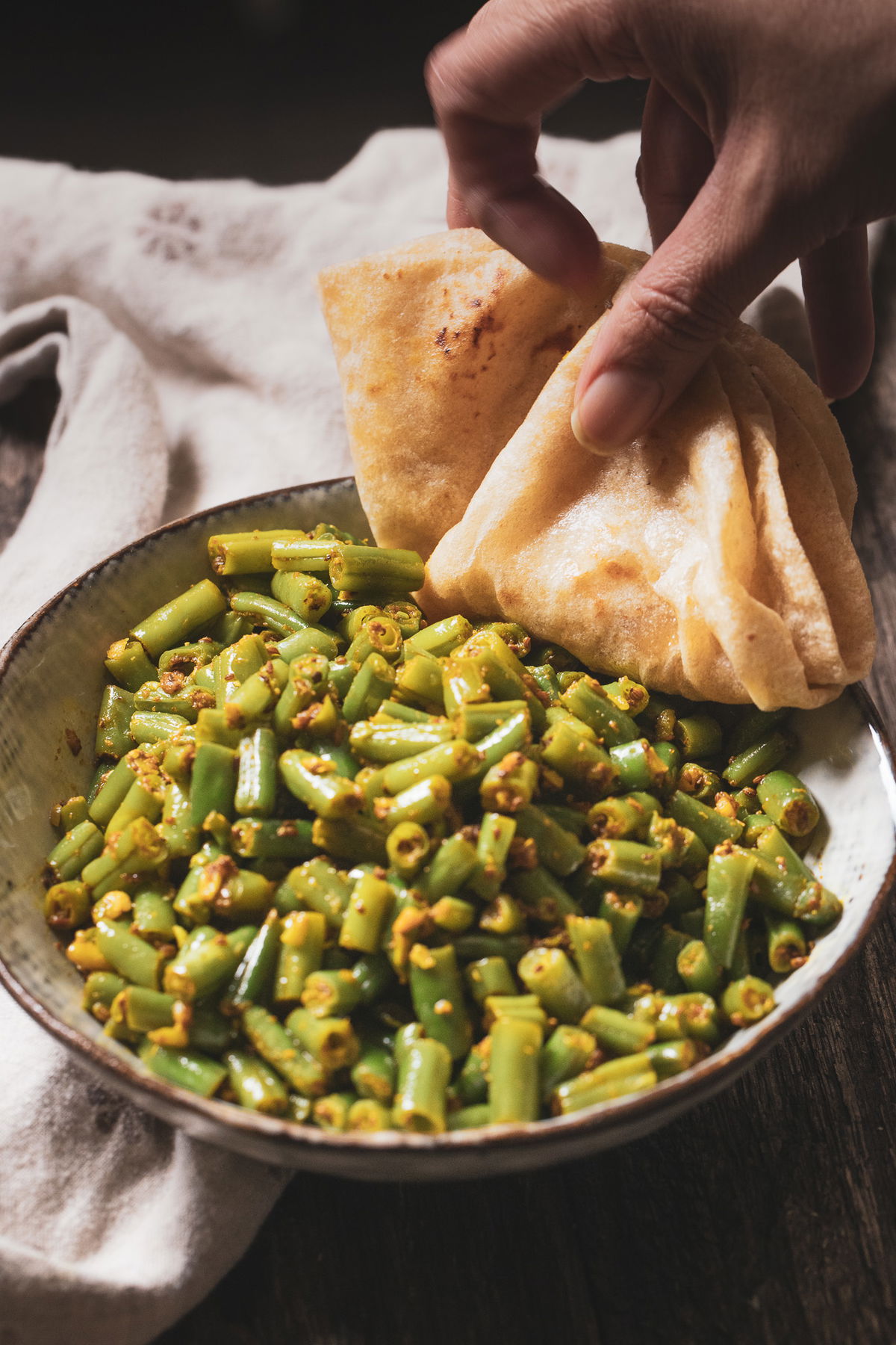 Taking fansi nu shaak with roti